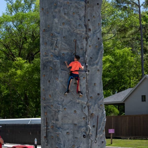 rock climbing at model home summit