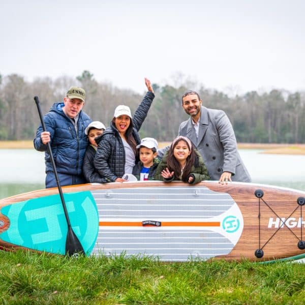 Family paddle boarding fun at Mirror Lake